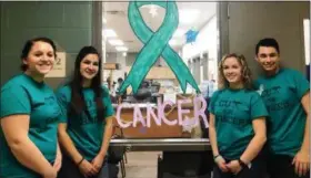  ?? SUBMITTED PHOTO ?? From left to right, Kutztown seniors Anna Battin and Ramsi Ross along with Exeter seniors Emily Dunning and Aaron Sadrovitz organized Cuts for Cancer Cut-A-Thon to raise funds for cancer research by offering salon service all day at BCTC East Campus in Oley on Dec. 4.