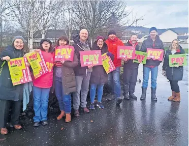  ?? ?? Industrial action EIS members on the picket line in Crieff during a strike earlier in the year