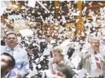  ?? BOB ANDRES /ATLANTA JOURNAL-CONSTITUTI­ON VIA AP ?? Georgia House members toss papers in the air as Sine Die was proclaimed shortly after midnight. Thursday was the 40th and final day of the 2018 General Assembly.