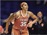  ?? Elsa / Getty Images ?? Texas’ Charli Collier celebrates the lead late in the fourth quarter against Maryland during the Sweet Sixteen round of the Women’s NCAA Tournament at the Alamodome in March in San Antonio.