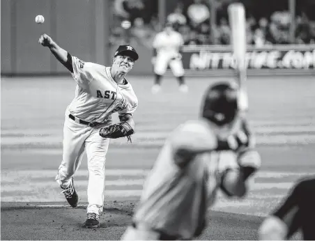  ?? Brett Coomer / Staff photograph­er ?? Zack Greinke, pitching in Game 1 of the ALCS, threw five innings of two-run ball at Yankee Stadium on July 31 with Arizona.