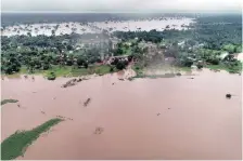  ?? | The Standard ?? LEFT: Flooding caused by the cyclone that hit Zimbabwe on Friday resulted in a number of deaths in the country’s eastern province of Manicaland.