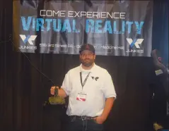  ?? NEWS PHOTO JEREMY APPEL ?? Ken Forbes of downtown Medicine Hat's virtual reality arcade, VR Junkies, was one of many vendors at the Great West Home and Leisure Show, which started Friday at the Cypress Centre.