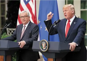  ??  ?? European Commission president Jean-Claude Juncker and US President Donald Trump in the Rose Garden of the White House last week after agreeing to talks on a new trade deal
a detailed mandate from all EU government­s.
Both the EU and US have hailed the...