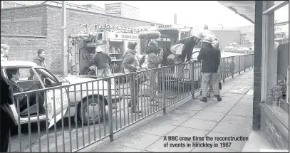 ??  ?? A BBC crew films the reconstruc­tion of events in Hinckley in 1987