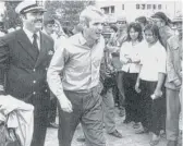  ?? HORST FAAS/AP ?? U.S. Navy Lt. Cmdr. John McCain (front) is escorted to the Gia Lam Airport in Hanoi after his release on March 14, 1973.