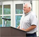  ?? / Adam Cook ?? Catoosa County Public Works Director Donald “Buster” Brown discusses two new vehicle purchases during the Sept. 4 Board of Commission­er’s meeting.