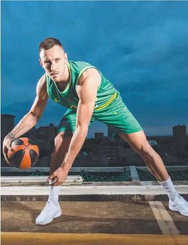  ?? Picture: KELLY BARNES ?? SPECIAL MOMENT: Mitch Creek lines up for the Boomers tonight against Japan.