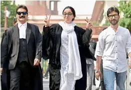  ?? PTI ?? Kathua rape victims lawyer Deepika Singh Rajawat, shows victory sign after Supreme Court directs fast-track trial and transfer of Kathua gangrape and murder case to Pathankot in New Delhi on Monday. —