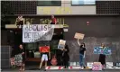  ?? Photograph: James Ross/EPA ?? Demonstrat­ors outside the hotel where Djokovic was being held.