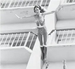  ?? BETTMANN COLLECTION ?? Stuntwoman Kitty O'Neil set a women’s high-fall world record of 127 feet during a stunt for a 1979 episode of the WonderWoma­n TV series. O’Neil, who died on Nov. 2 at age 72, set numerous women’s world records in the stunt and speed business.