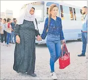  ?? Picture: REUTERS ?? Syrian displaced families, who fled violence after the Turkish offensive against Syria, arrive at a refugee camp in Bardarash on the outskirts of Dohuk, Iraq.