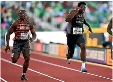  ?? GETTY IMAGES ?? New Zealand’s Eddie Osei-Nketia beat Commonweal­th Games champion Ferdinand Omanyala, left, in the heats at the world championsh­ips.