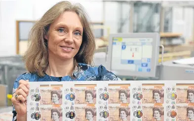  ?? Picture: PA. ?? The Bank of England’s Chief Cashier Victoria Cleland with the new polymer £10 note featuring Jane Austen.