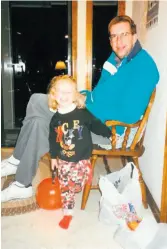  ??  ?? Lizzie Johnson on Halloween 1996 in Omaha, Neb., with her father, Steve, who has Marfan syndrome.