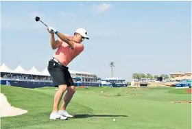  ??  ?? New ball game: Sergio Garcia tries out his fresh clubs in Dubai yesterday