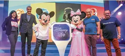  ?? –PHOTOS BY LEO M. SABANGAN II ?? Filipinian­a-clad Mickey and Minnie Mouse are flanked by Amrita Pandey, head of media distributi­on and OTT, The Walt Disney Company South Asia; Mahesh Samat, EVP and managing director The Walt Disney Company South Asia; Ernest Cu, Globe Telecom...
