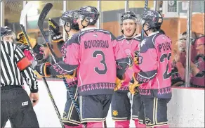  ?? TINA COMEAU ?? The pink jerseys the Mariners wore during their annual campaign.