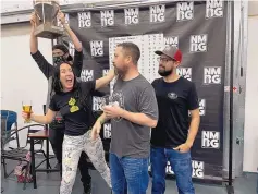  ?? COURTESY OF JAKE GUTIÉRREZ ?? The Boxing Bear brewing crew celebrates their 2021 New Mexico Brewers Guild IPA Challenge victory. From left is Dylan Davis, Guild executive director Leah Black, Boxing Bear head of brewing Justin Hamilton and Jay Knigge.