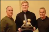  ?? KYLE FRANKO — TRENTONIAN PHOTO ?? Hopewell Valley’s Pat Allex, center, is presented the Charles J. “Fuzzy” Falzone Memorial Award by Mike Calisti, left, and George Rago, at the 12th Man TD Club dinner on Tuesday at Massimo’s Restaurant in Robbinsvil­le.