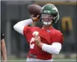  ?? BILL KOSTROUN - THE ASSOCIATED PRESS ?? New York Jets first-round draft pick Zach Wilson works out during NFL football rookie camp, Friday, May 7, 2021, in Florham Park, N.J.