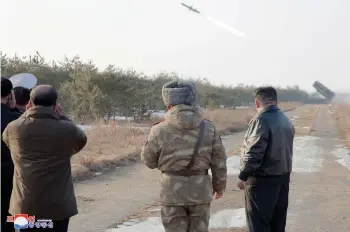  ?? — AFP photo ?? Photo released by KCNA shows Kim (right) inspecting the evaluation test-fire of new-type surface-to-sea missile Padasuri-6 at an undisclose­d location in North Korea.