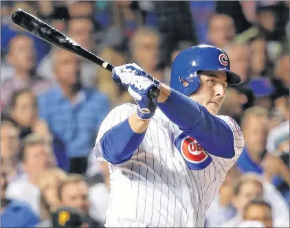  ?? AP PHOTO/CHARLES REX ARBOGAST, FILE ?? In this Aug. 29, 2017, photo, Chicago Cubs’ Anthony Rizzo doubles off Pittsburgh Pirates starting pitcher Chad Kuhl during the sixth inning of a baseball game, in Chicago. Rizzo arrived for its first full-squad workout after returning to Florida to...