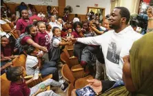  ?? Jessica Griffin / Tribune News Service ?? Rapper Meek Mill greets students at Philadelph­ia’s James G. Blaine Elementary School on Wednesday.