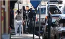  ?? Photograph: Raymundo Ruiz/AP ?? Julián Leyzaola Pérez, center, walks past the body of a top municipal police officer in Ciudad Juárez.