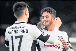  ??  ?? Declan McDaid with Lawrence Shankland in their Ayr United days – now they are rivals at the Dundee clubs.