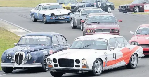  ??  ?? Classic Sports Car Club action at Anglesey Circuit Picture: NEIL LAMBERT