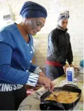  ??  ?? TASTE OF A BETTER LIFE: Chavonne Cloete, left, and Chantel Sampson prepare lunch.