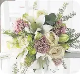  ??  ?? FLOWERS: Rosebud fresh flowers bouquet by Appleyard London, www.notonthe highstreet.com, £31.99