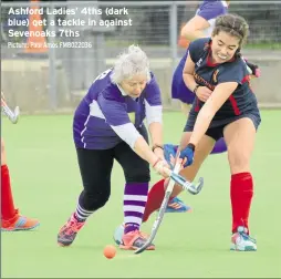  ?? Picture: Paul Amos FM8022036 ?? Ashford Ladies’ 4ths (dark blue) get a tackle in against Sevenoaks 7ths