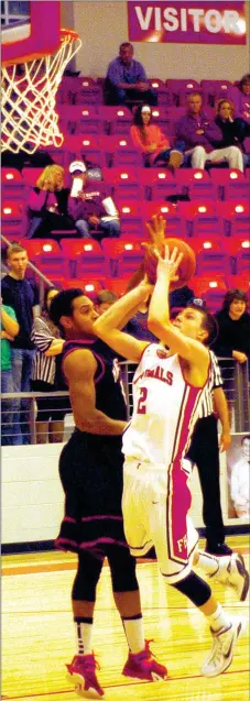  ?? MARK HUMPHREY ENTERPRISE-LEADER ?? Farmington sophomore Matt Wilson’s ability to get to and finish at the basket was a key factor in the Cardinals’ 59-56 upset of No. 1 ranked Maumelle on Friday. Wilson scored 15 points on Colors Day.