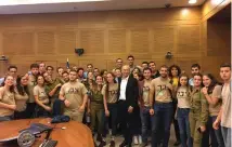  ?? (Tzabar) ?? THE INTERNATIO­NAL Tzabar branch of the scouts visits the Knesset in honor of Aliyah Day.