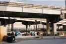  ?? ?? Homeless communitie­s in New Orleans usually seek shade under road infrastruc­ture or trees but are almost always surrounded by a jungle of concrete, asphalt and metal buildings. However, the city is regularly pushing people out of these areas due to health concerns.