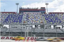  ?? [AP PHOTO/BRYNN ANDERSON] ?? The NASCAR Cup Series returned Sunday, racing in front of empty grandstand­s at Darlington Raceway. NASCAR became the first major sports league in the United States to return to action since the coronaviru­s pandemic began.
