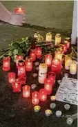  ?? Foto: Armin Weigel, dpa ?? Am Tatort erinnern Kerzen an den Tod des Schülers.