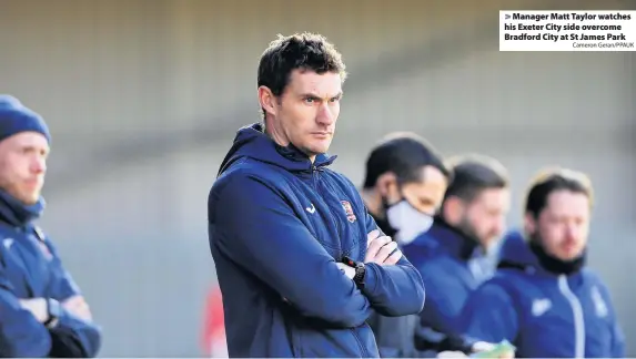  ?? Cameron Geran/PPAUK ?? Manager Matt Taylor watches his Exeter City side overcome Bradford City at St James Park