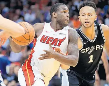  ?? MIKE EHRMANN/GETTY IMAGES ?? Though no one on the Heat is using it as an excuse, Dion Waiters’ balky ankle has been an issue through the first five games this season.