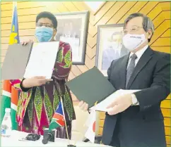  ??  ?? Mutual benefit… Sport minister Agnes Tjongarero and Japan’s ambassador to Namibia Hideaki Harada seen here after signing a MoC in Windhoek yesterday.