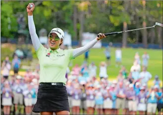  ?? CHRIS CARLSON/AP PHOTO ?? Minjee Lee, of Australia, celebrates a win after the final round of the U.S. Women’s Open on Sunday at the Pine Needles Lodge & Golf Club in Southern Pines, N.C.