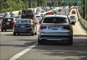  ?? DREAMSTIME ?? The average age of light vehicles in operation has hit a record, increasing by two months this year to 12.2 years, according to S&P Global Inc. Pictured is afternoon rush hour traffic on Interstate 95 in Maryland in 2020.