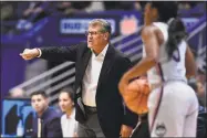  ?? Jessica Hill / Associated Press ?? UConn coach Geno Auriemma gestures to his team during the second half against DePaul in Hartford Wednesday.