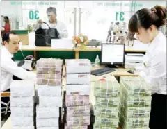  ?? VIETNAM NEWS AGENCY/VIET NAM NEWS ?? Banks in Vietnam are expected to cut lending interest rates with support from the central bank.