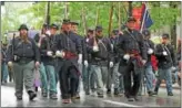  ?? PHOTOS BY CHRIS BARBER — DIGITAL FIRST MEDIA ?? A group of Civil War re-enactors not only marched, but also shot their guns at the Kennett Square Memorial Day parade Monday.