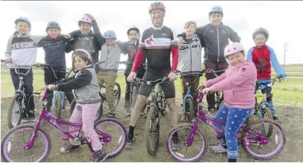  ?? NICK LEES ?? Don Patterson brought sections of the community together with Enoch Cree Nation leaders to create a BMX-style pump track on Enoch Cree Nation land and had 42 bikes and 50 helmets donated for the children.