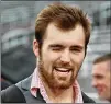  ?? CURTIS COMPTON / CCOMPTON@AJC.COM ?? Georgia QB Jake Fromm (above, giving fans a wink at a Dawg Walk) is, if nothing else, a man of few intercepti­ons.