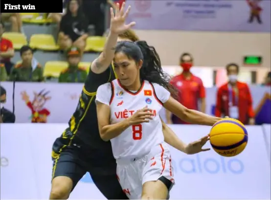  ?? VNA/VNS Photo Tuấn Đức ?? GREAT EIGHT: The Vietnamese women's basketball team defeated Malaysia 21-13 for their first victory on Friday.